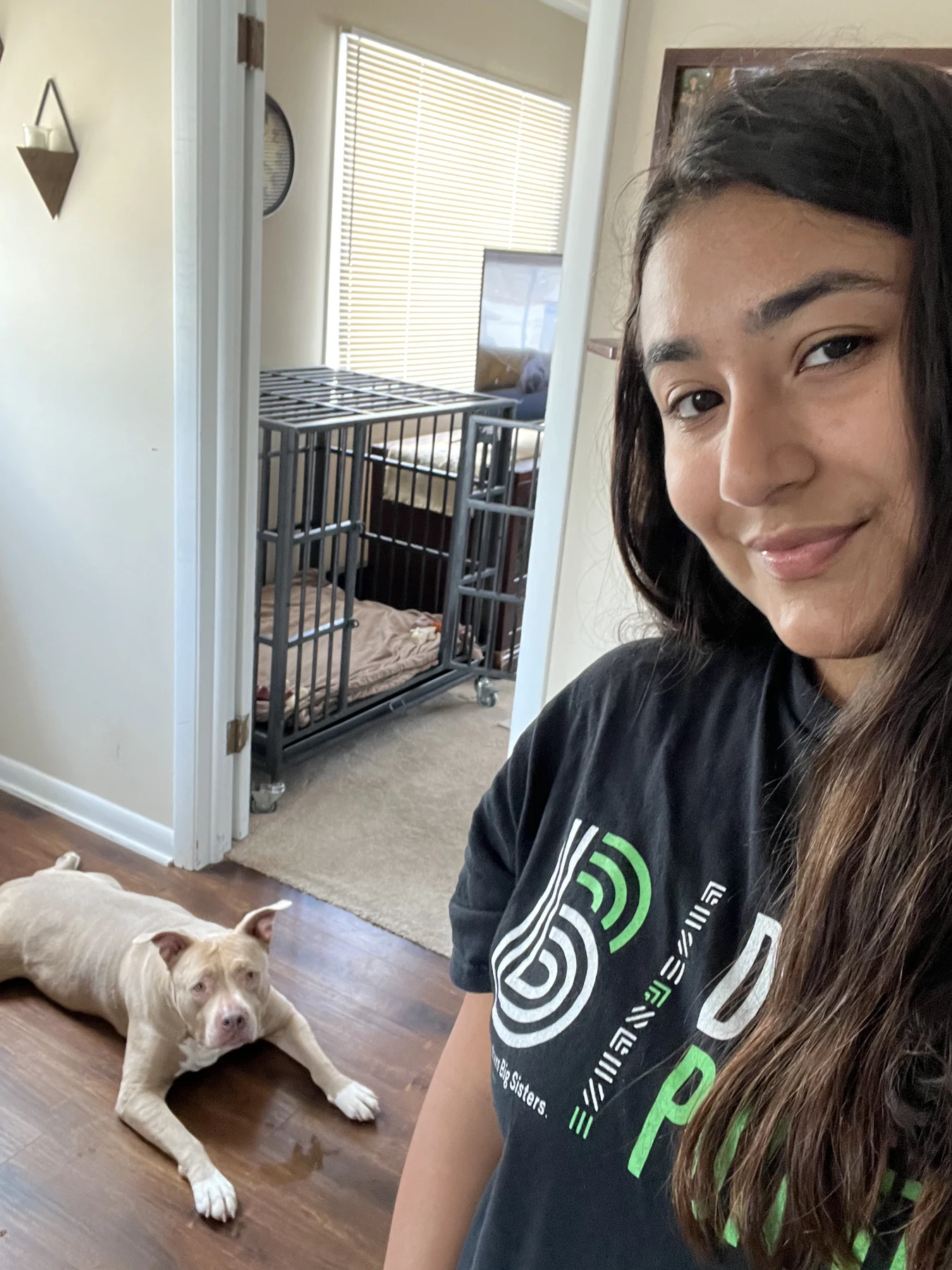 Tania spending time with a dog in her care